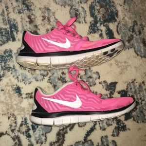 Pink Nike tennis shoes size 6.5